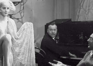 Huppertz plays the piano on the set of Metropolis